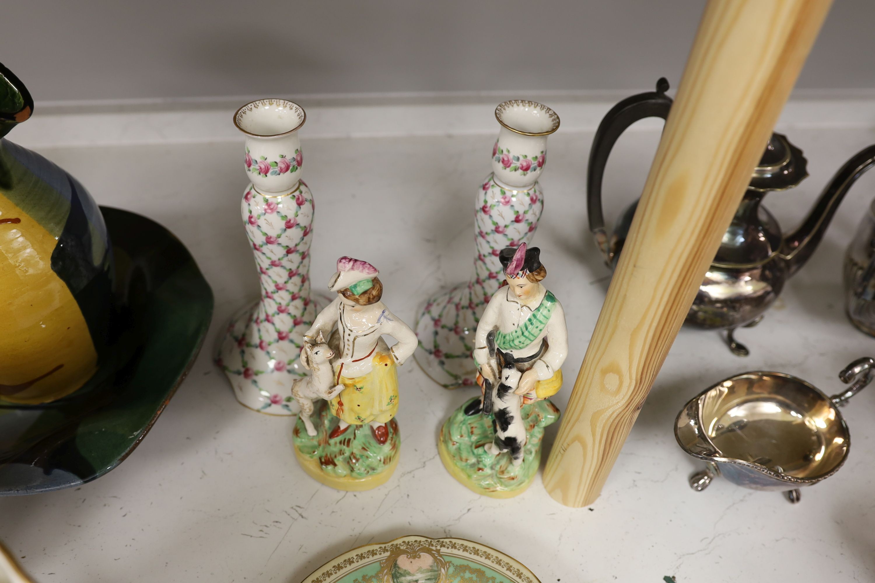 A pair of Dresden candlesticks, various art pottery jugs and a dish and other ceramics